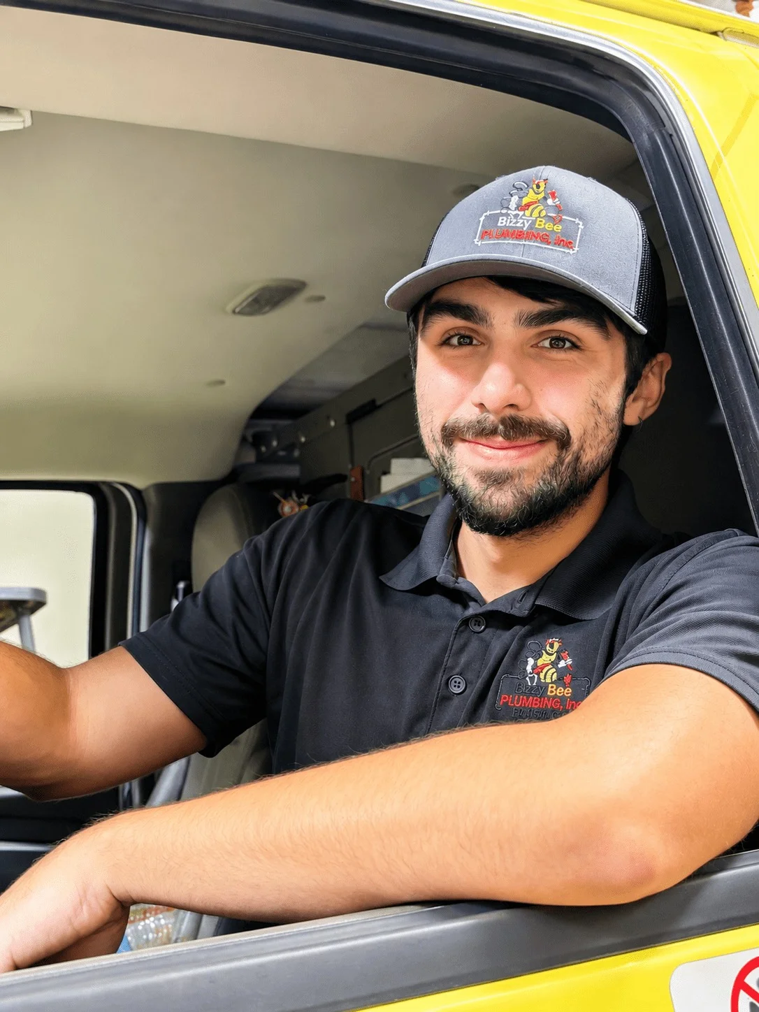 Bizzy Bee Plumbing technician preparing for a High Point plumbing service call